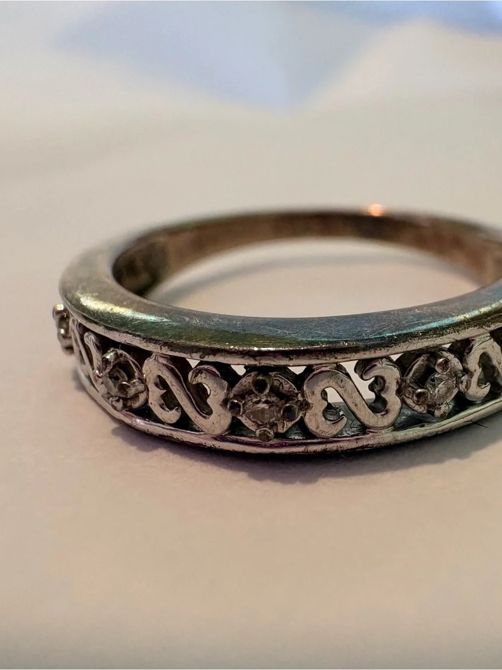 925 sterling silver open hearts ring with accent diamonds. Size 8.